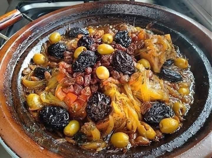 Moroccan Lamb Tagine with Prunes, Olives, and Raisins – A Sweet and Savory Delight